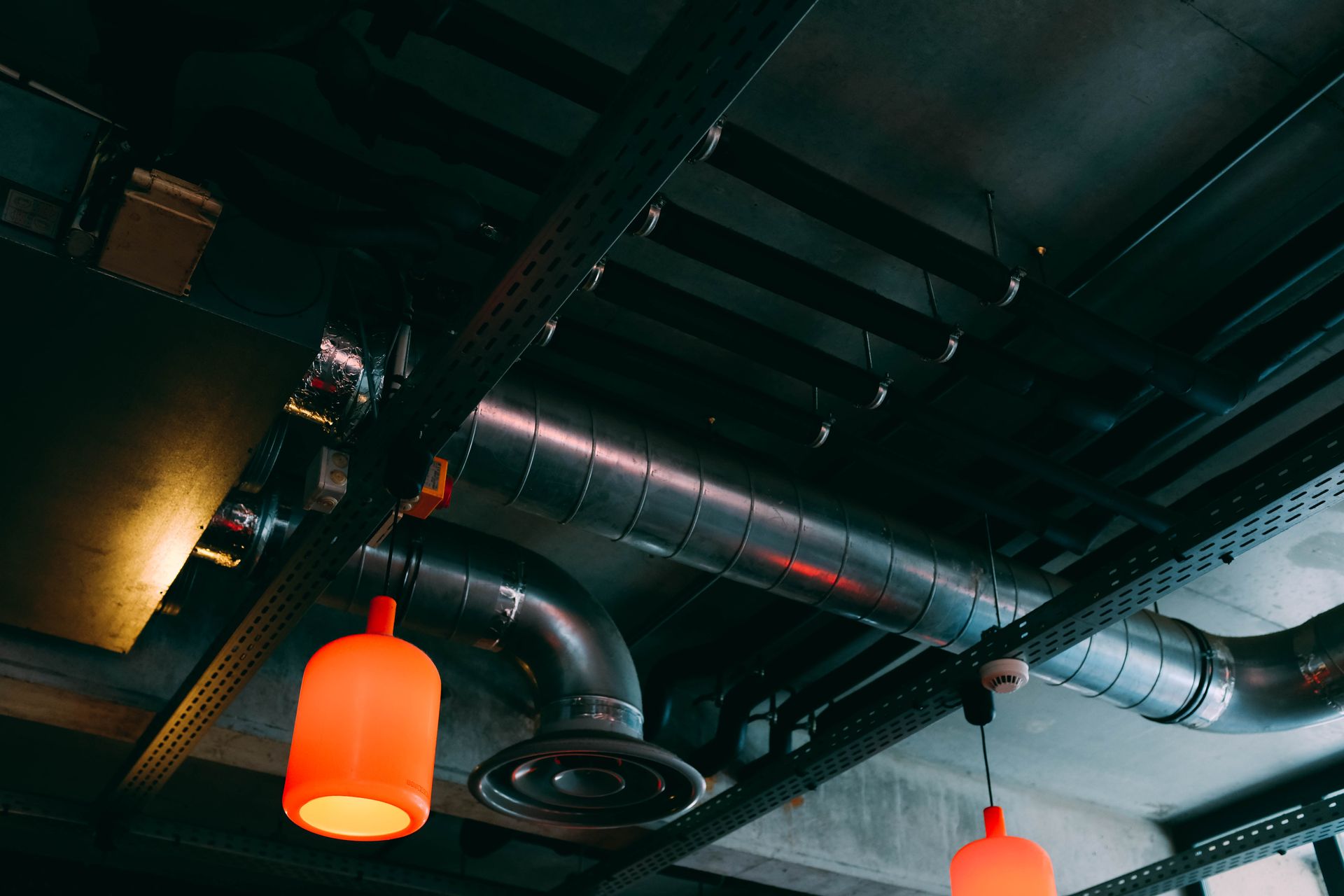 Exposed commercial ceiling ductwork and ventilation